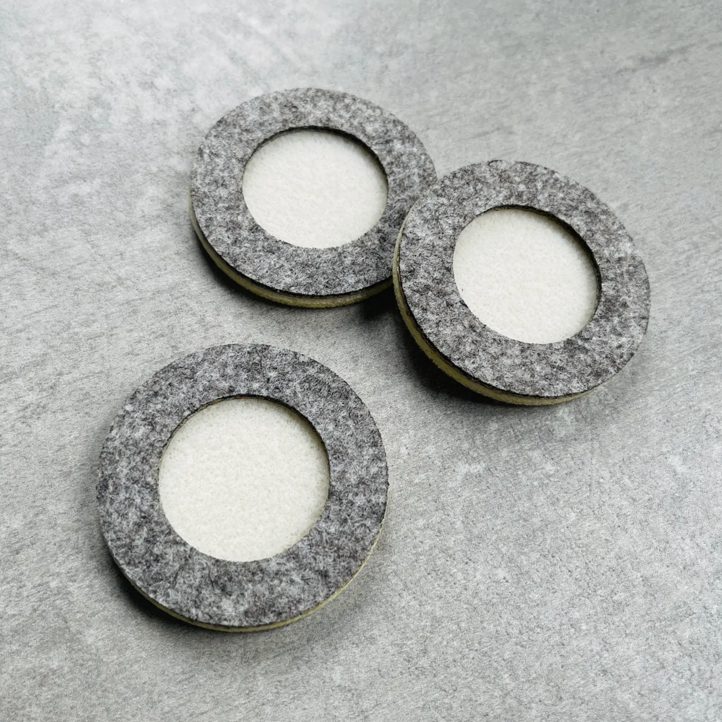 Round boxes in beaded mat material