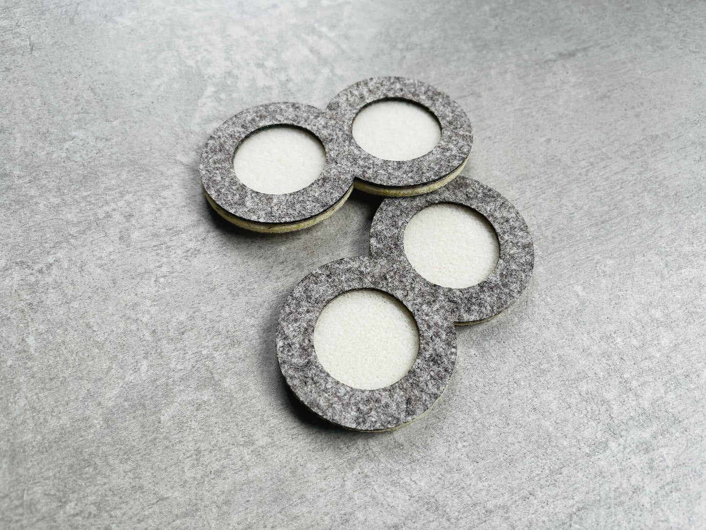 Double round boxes in beaded mat material