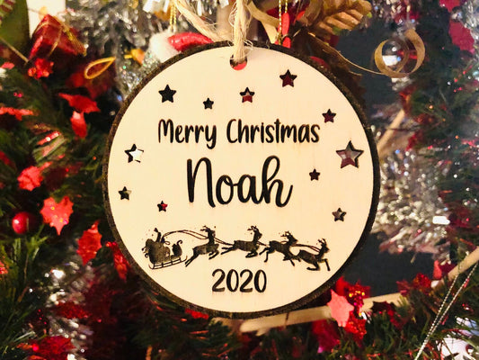 Customizable wooden Christmas ball with Santa Claus and sleigh pattern